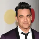 Robbie Williams in terapia intensiva, dieta vegan e pilates per riprendersi