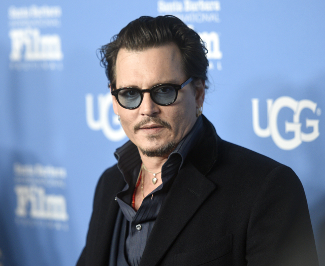 Johnny Depp vende casa per mantenere Amber Heard