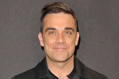 Robbie Williams passa alla Sony Music e annuncia nuovo disco