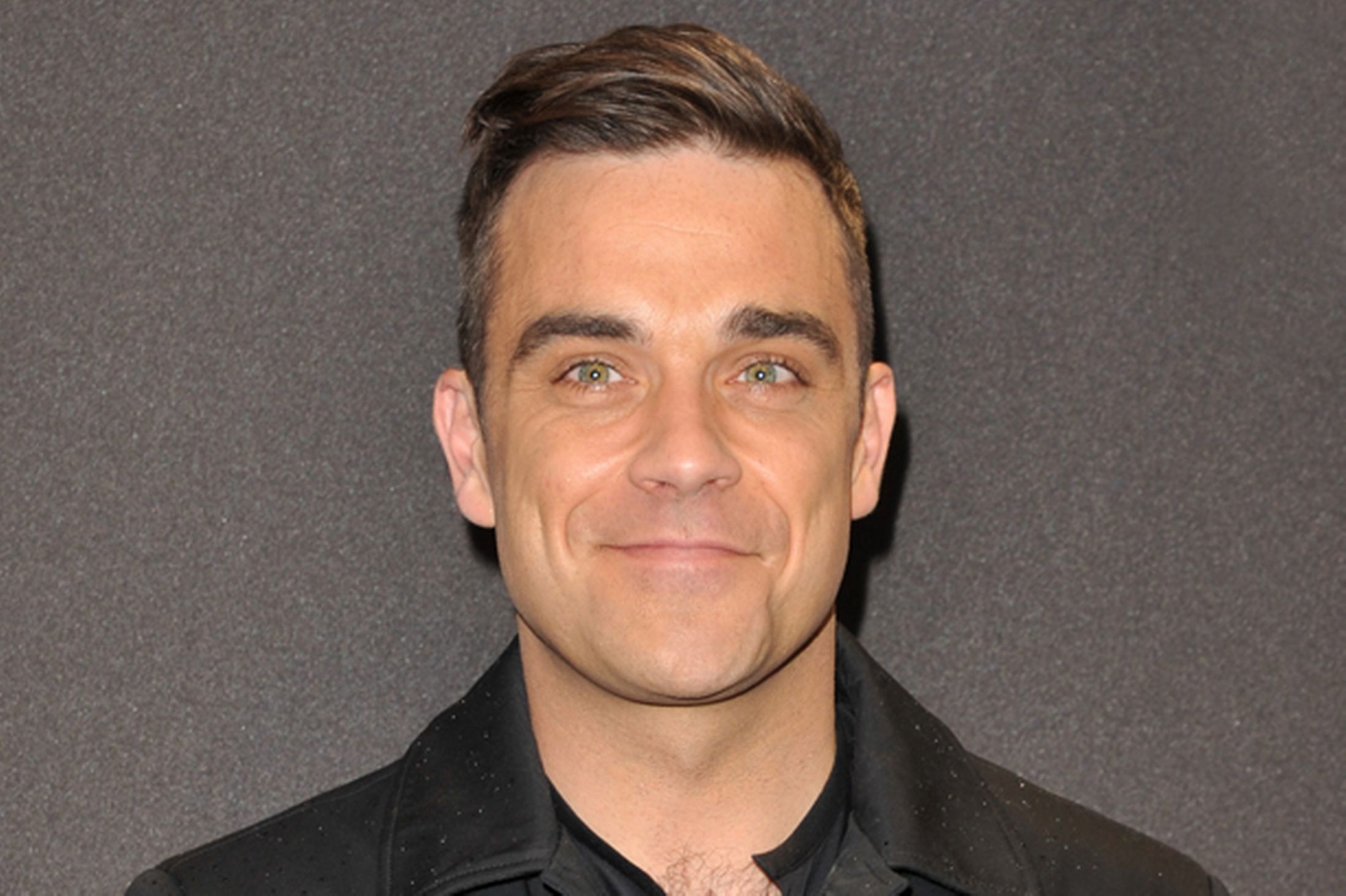 Robbie Williams passa alla Sony Music e annuncia nuovo disco