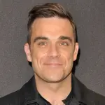 Robbie Williams passa alla Sony Music e annuncia nuovo disco